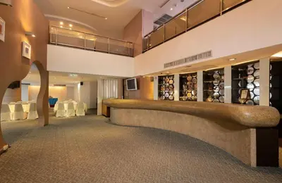 a wine tasting room with a wine cellar at Veronica Residence in Bangkok
