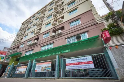 a building with a fence in front of it at Sivalai Place in Bangkok