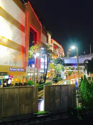 a view of a city street at night at Mall Suites Hotel in Bangkok