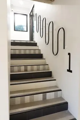 a staircase with a sign on the wall at Bedspread Hostel in Bangkok