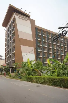 a large building with a hotel in front of it at Crystal Place Parkkred in Nonthaburi
