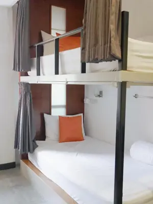 a couple of bunk beds in a room at Tiny Taladnoi Hostel in Bangkok