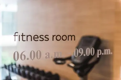 a close up of a cell phone in aistance room at twothree a homely hotel - SHA Extra Plus in Bangkok