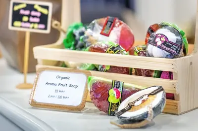 a table with two baskets of different types of food at De Lavender Bangkok Hotel in Bangkok