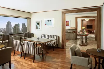 a dining room with a table and chairs at The Westin Grande Sukhumvit, Bangkok in Bangkok