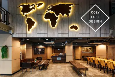 a restaurant with a map of the world on the wall at Rest24 Residence in Bangkok