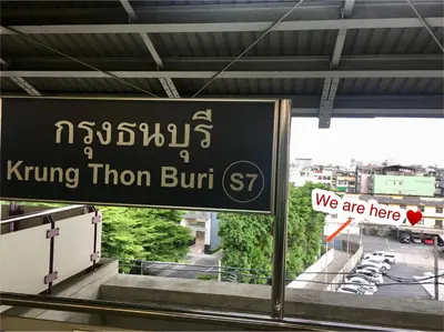 a sign that reads kung than burritos and we are here at Bangkok Sanookdee Hostel in Bangkok
