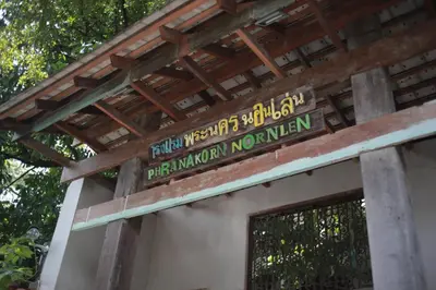 a sign on the side of a building at Phranakorn-Nornlen in Bangkok