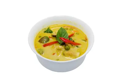 a white bowl of soup on a white background at New Siam II in Bangkok