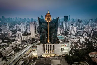 a view of a city with a tall building at Grande Centre Point Hotel Terminal21 in Bangkok