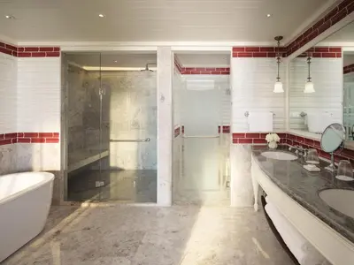 a bathroom with a shower and a tub and a sink at Mandarin Oriental, Bangkok in Bangkok