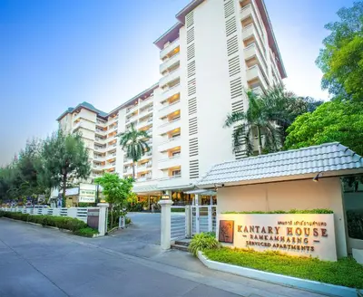 a large white building with a sign in front of it at Kantary House Hotel, Bangkok in Bangkok