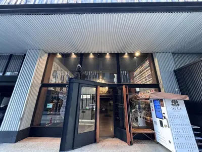an entrance to a store with a door open at White Palace Bangkok in Bangkok