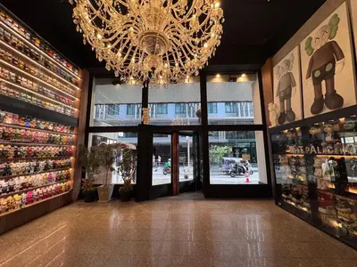 a chandelier hanging from the ceiling in a store at White Palace Bangkok in Bangkok