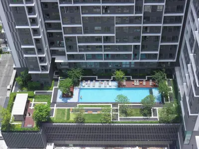 an overhead view of a building with a swimming pool at The SkyHouse Duplex - Luxury Home in Bangkok