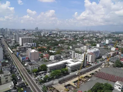 an aerial view of a city with buildings at The SkyHouse Duplex - Luxury Home in Bangkok