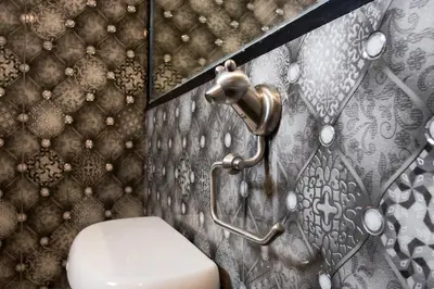 a bathroom with a toilet and a shower at DB Plus 5 in Bangkok