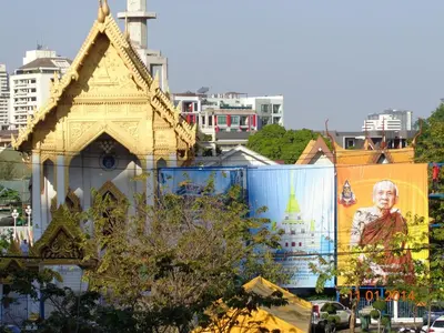a building with a painting on the side of it at Lodge 61 Hotel in Bangkok