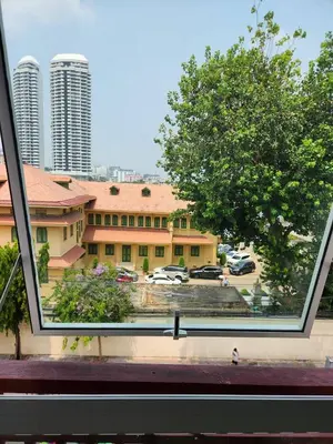 a view of a building from a window at Casa Picasso Near Chabad House in Bangkok