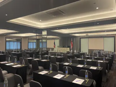 a large room with tables and chairs in it at Witz Bangkok Ramkhamhaeng in Bangkok