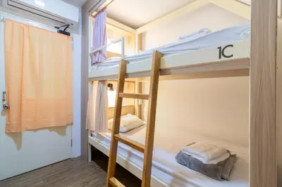 a bunk bed in a room with two bunk beds at The Victory View in Bangkok