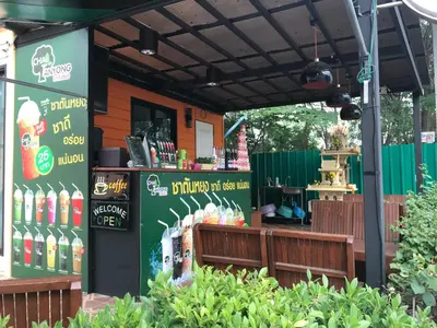 a food stand with a sign in front of it at Angie Resort at Sapan Mai in Bangkok