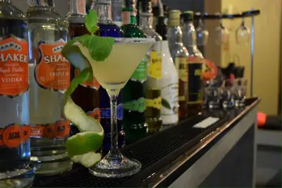 a drink in a martini glass sitting on a bar at U431 Chaengwattana in Nonthaburi
