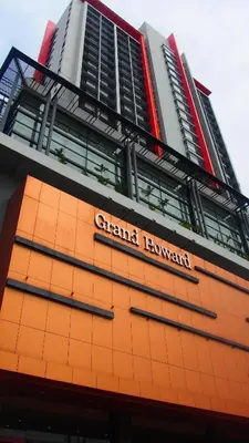 a sign on the side of a building at Grand Howard Hotel Bangkok in Bangkok