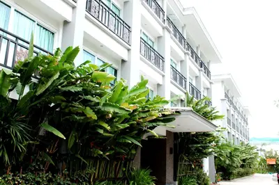 a building with plants on the side of it at 14 Resort in Bangkok