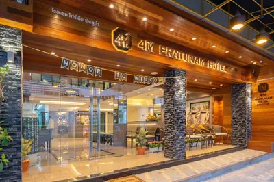a store front of a building with a restaurant at 4M Pratunam Hotel in Bangkok