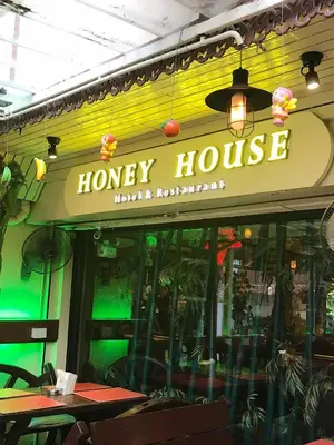 a honey house restaurant with a sign that reads honey house at Honey House1 hotel in Bangkok