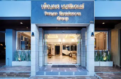 a building with a sign that reads powers residence group at Penyos Residence in Bangkok