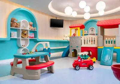 a play room with toys and a toy car at Centre Point Sukhumvit 10 in Bangkok