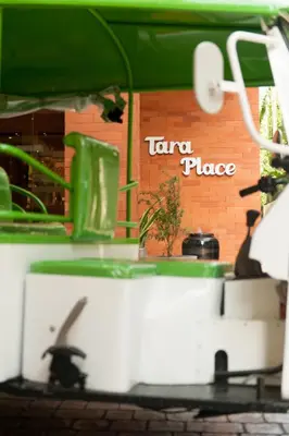 a sign that says taza place on a building at Tara Place Hotel Bangkok in Bangkok