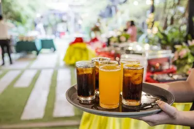 a tray with four beer glasses on a table at The Loft Resort Bangkok in Bangkok