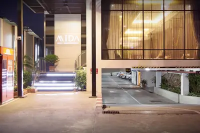 a hallway of a building with aania sign on it at Mida Hotel Ngamwongwan - SHA Plus in Nonthaburi
