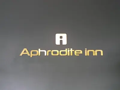 a sign with a apothecary at Aphrodite Inn Bangkok in Bangkok
