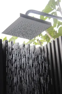 a light on top of a black fence at Nine Forty One Hotel in Bangkok