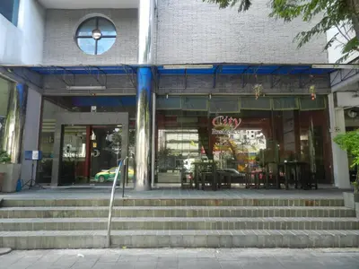 a store with stairs in front of a building at City Residence Rama 6 in Bangkok