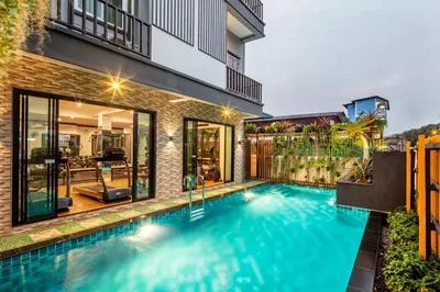 an image of a swimming pool in a house at Penyos Service Apartment in Bangkok