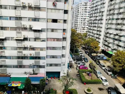an overhead view of a city street with a tall building at Dailyroom C3,C4by Anna in Nonthaburi
