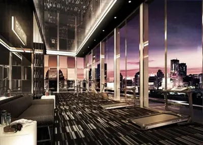 a lobby of a building with a view of a city at Luxury Apartment near Downtown (Pick-up Service) in Bangkok