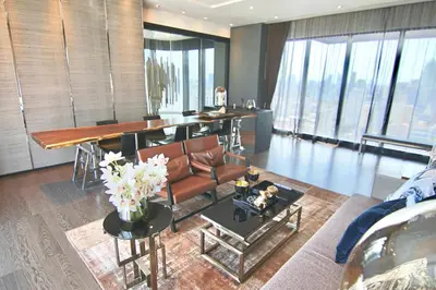 a living room with a couch and a table at Luxurious & Romantic in the Heart of BKK. MRT/BTS! in Bangkok