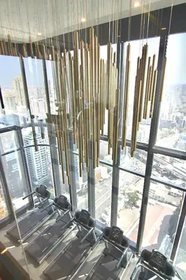 a room with a large window with a view of a city at Luxurious & Romantic in the Heart of BKK. MRT/BTS! in Bangkok