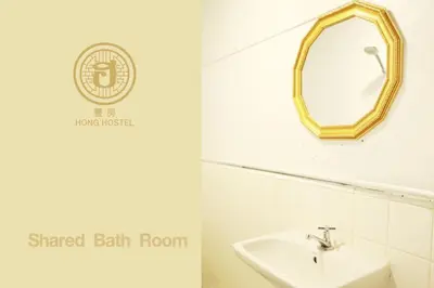 a bathroom with a sink and a mirror at Hong hostel in Bangkok