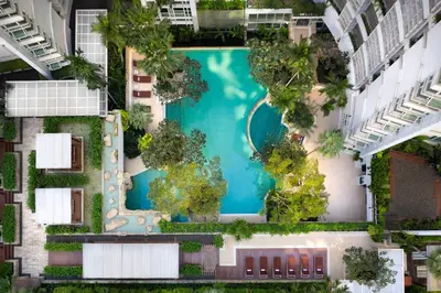 an overhead view of a swimming pool in a building at Dusit Suites Hotel Ratchadamri, Bangkok in Bangkok