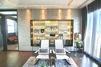a living room with two white chairs and a shelf at Luxurious & Romantic in the Heart of BKK#H MRT/BTS! in Bangkok