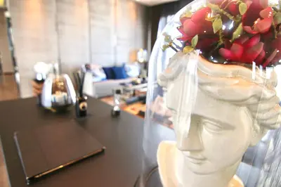 a statue of a woman with a flower on her head at Luxurious & Romantic in the Heart of BKK#H MRT/BTS! in Bangkok