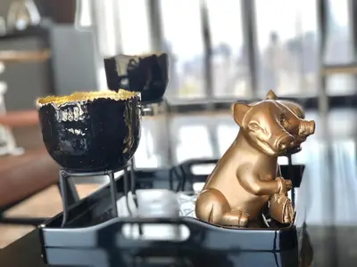 a statue of a dog sitting on a table at Luxurious & Romantic in the Heart of BKK#H MRT/BTS! in Bangkok