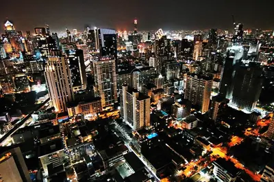 a view of a city at night at Luxurious & Romantic in the Heart of BKK#H MRT/BTS! in Bangkok